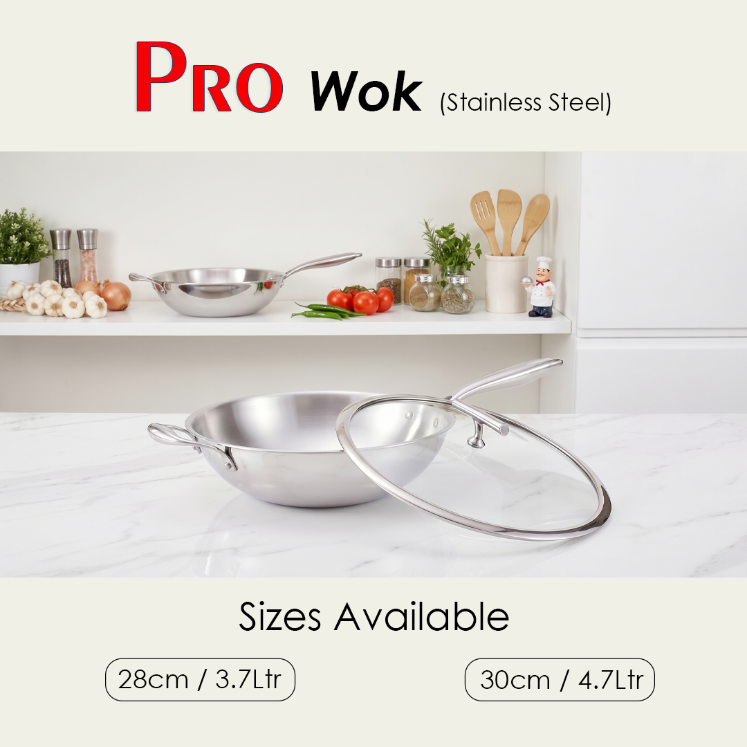 PRO Wok (Stainless Steel) – Available in 2 Sizes: 28cm / 3.7 Ltr & 30cm / 4.7 Ltr PRO Wok in stainless steel with glass lid displayed on a marble countertop in a modern kitchen, with a second wok visible on a shelf alongside fresh vegetables and herbs, and two available sizes listed: 28cm / 3.7 Ltr and 30cm / 4.7 Ltr